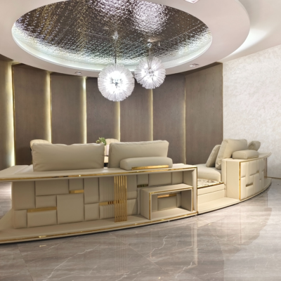 Semi leather curved living room sofa hardware construction and plush cushion detail view