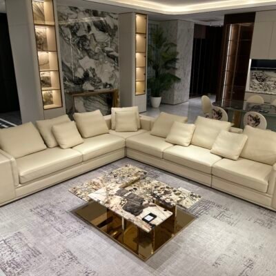 Multi material corner sofa living room set styled in contemporary open plan home interior