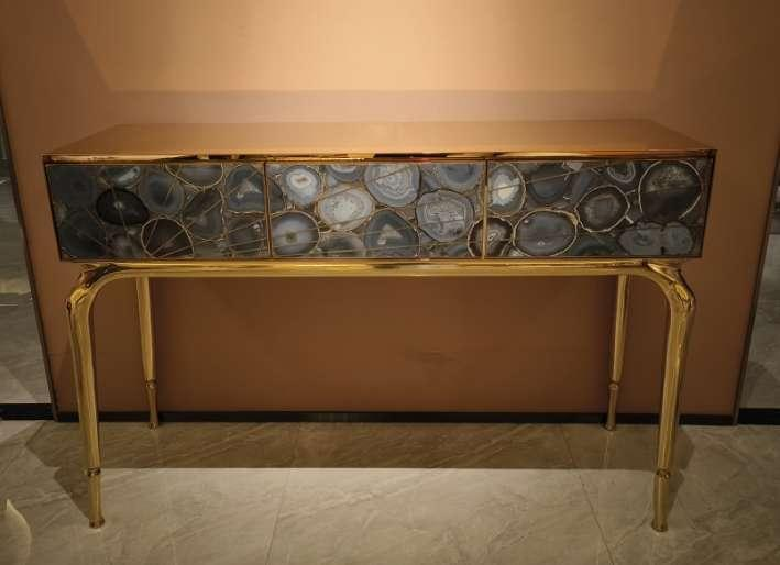 Contemporary agate console hallway styled modern residential entrance interior Babylonian copper steel legs natural stone