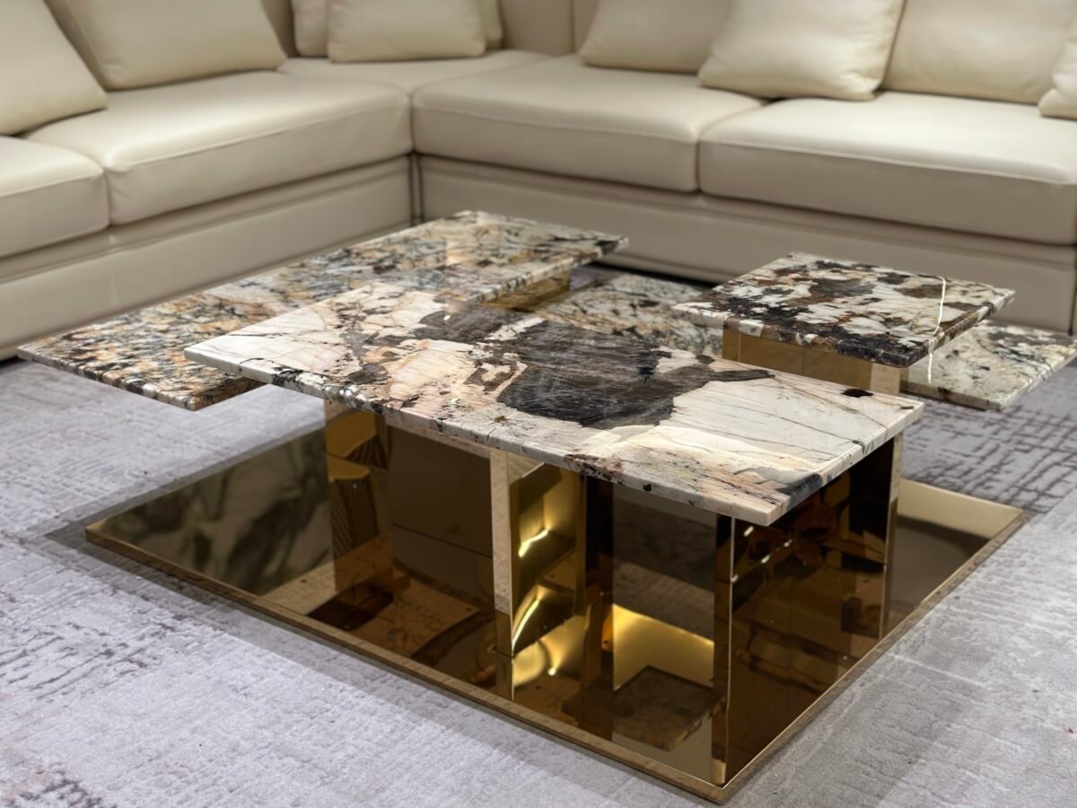 Single hardware gold base stone coffee table 125cm light dark variant stone surface tone comparison pedestal base detail