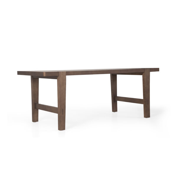 Dining table in wood surface finish, side view